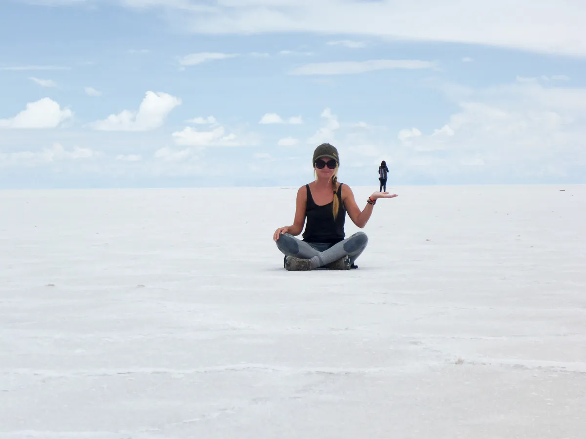 salar de uyuni in palm of hand slat flats